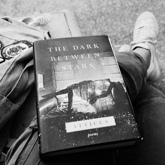 The Dark Between Stars – Hardcover by Atticus
